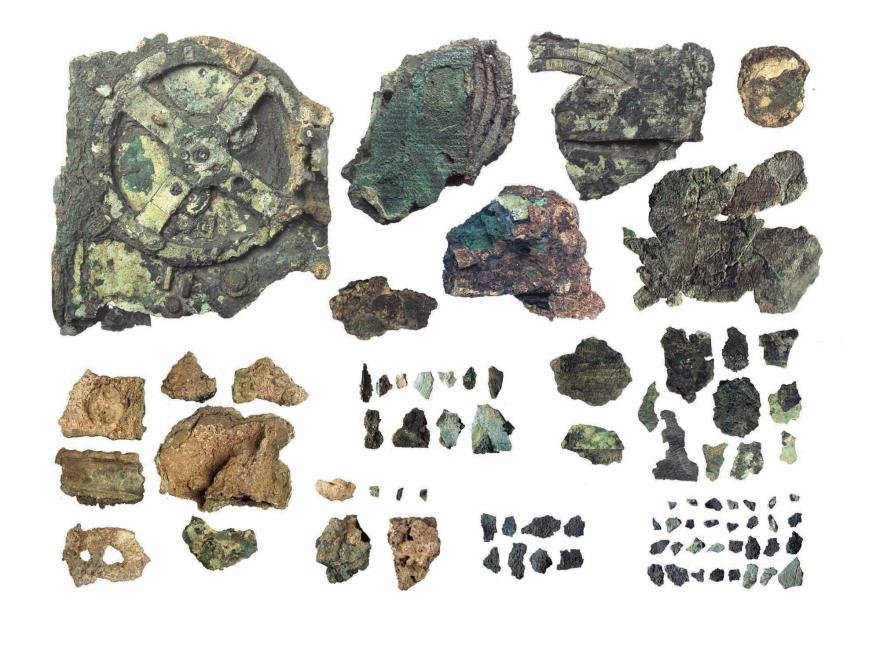 In the spring of 1901, a group of Greek sponge divers made an extraordinary discovery off the coast of the small island of Antikythera, located between Crete and mainland Greece. While sheltering from a storm, the divers explored the seabed and uncovered the remains of an ancient Roman-era shipwreck lying nearly 45 meters (150 feet) below the surface. The wreck contained an astonishing collection of artifacts, including marble and bronze statues, coins, jewelry, glassware, and other valuable cargo. Among these treasures was a heavily corroded lump of bronze that attracted little attention at first. No one suspected that this unremarkable object would become one of the greatest archaeological discoveries in history. Months later, as conservators carefully examined the corroded fragments at the National Archaeological Museum in Athens, they noticed tiny bronze gears hidden inside the object. This unexpected discovery revealed that the fragments belonged to an incredibly sophisticated mechanical device unlike anything ever found from the ancient world.