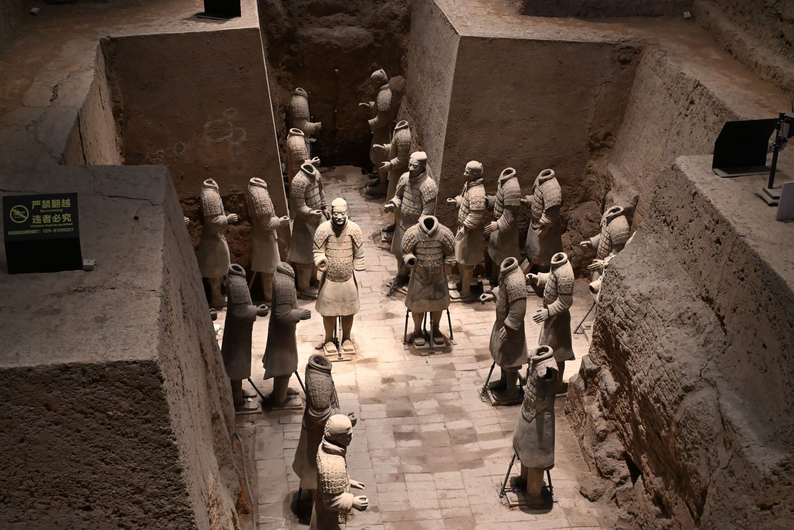 Terracotta Army excavation pit with thousands of life-sized clay soldiers in Xi'an